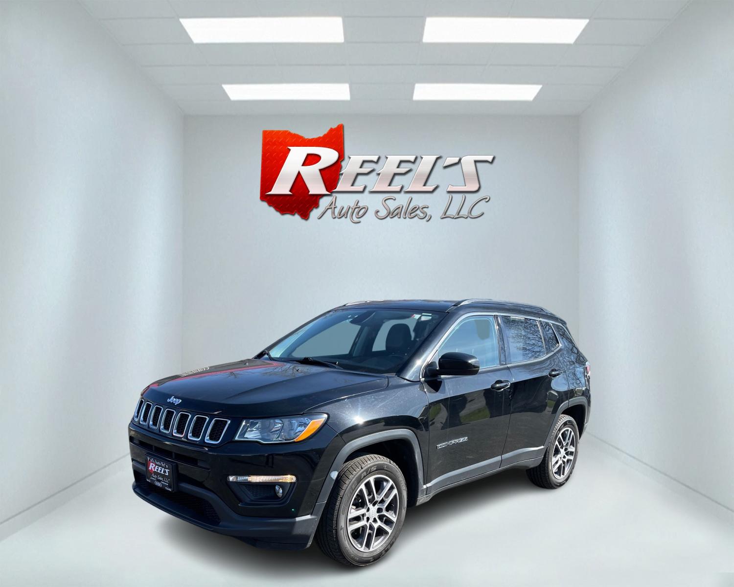 2017 Black /Black Jeep Compass Latitude 4WD (3C4NJDBB9HT) with an 2.4L I4 DOHC 16V engine, 9-Speed Automatic transmission, located at 547 E. Main St., Orwell, OH, 44076, (440) 437-5893, 41.535435, -80.847855 - This 2017 Jeep Compass Latitude 4WD is a capable and well-equipped compact SUV. It features a 2.4L I4 MultiAir engine paired with a 9-speed automatic transmission, delivering a smooth driving experience enhanced by Auto Start/Stop technology. Convenience features include push-button start, remote st - Photo #0